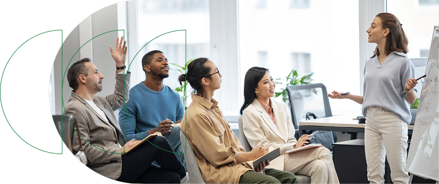 Team meeting with mentor presenting at whiteboard